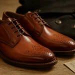 Heyraud chaussures en cuir de ville : montage et détail du bout rapporté